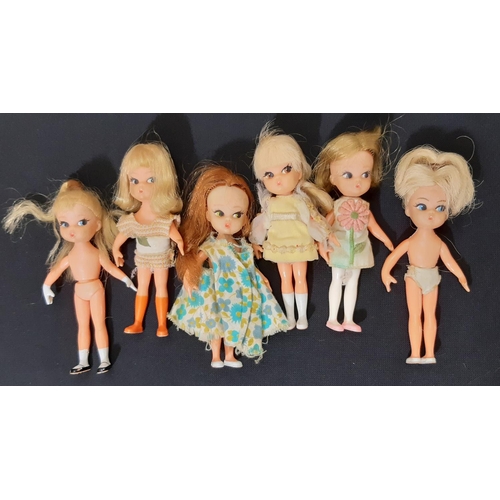 381 - Large collection of vintage dolls and dolls clothes including 3 Barbies by Mattel (all with twisting... 