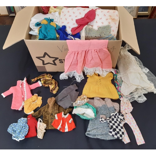 381 - Large collection of vintage dolls and dolls clothes including 3 Barbies by Mattel (all with twisting... 