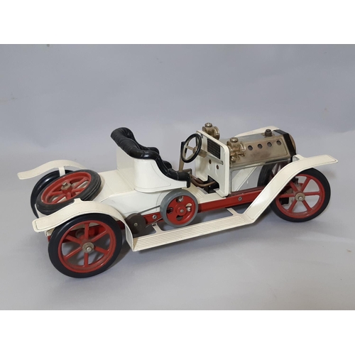 383 - 2 Mamod steam models comprising a white Roadster car with black seat and red spoked wheels, length 4... 