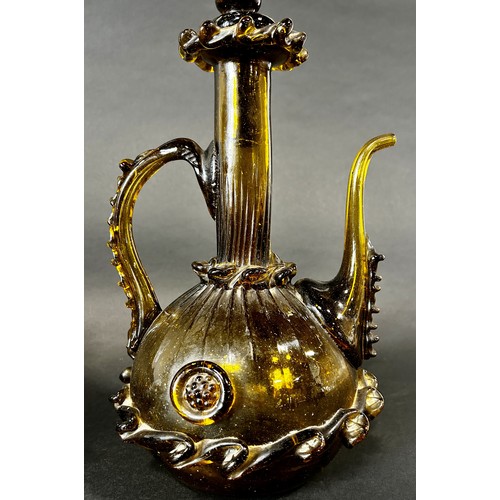 1110 - A Spanish Gardiola amber green glass decanter, with a long slender neck and swan stopper, 46cm high.