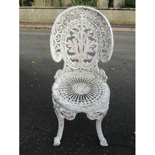 2015 - A painted cast aluminium garden terrace table and 2 chairs with decorative pierced details