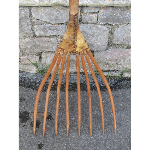 2128 - A large traditionally-made agricultural eight-pronged fork,  162cm.