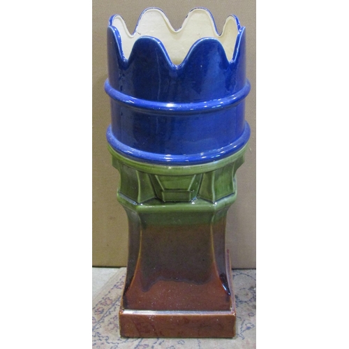 2129 - A large novelty majolica type ceramic planter, in the form of a crown top chimney pot, 77cm high.