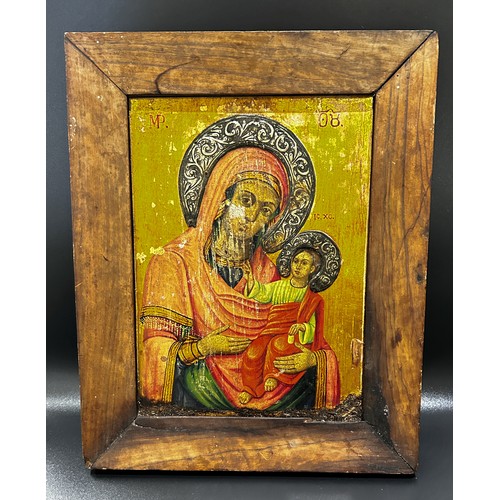 75 - 19th Century Russian icon of Madonna and Child, tempera and gilding on panel with white metal repous... 