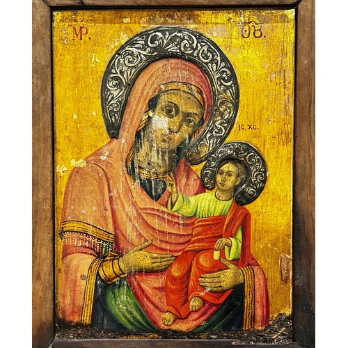 75 - 19th Century Russian icon of Madonna and Child, tempera and gilding on panel with white metal repous... 