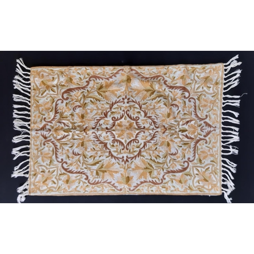 432 - Indian crewel work  rug with fringe and cotton backing 90x60cm together with a cotton dhurrie type r... 