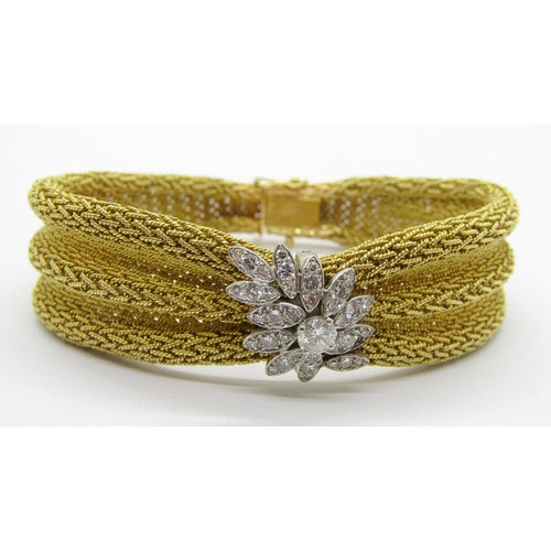 1307 - Fine Cartier vintage 18ct yellow gold ribbon bracelet set with a cluster of thirty-seven diamonds in...