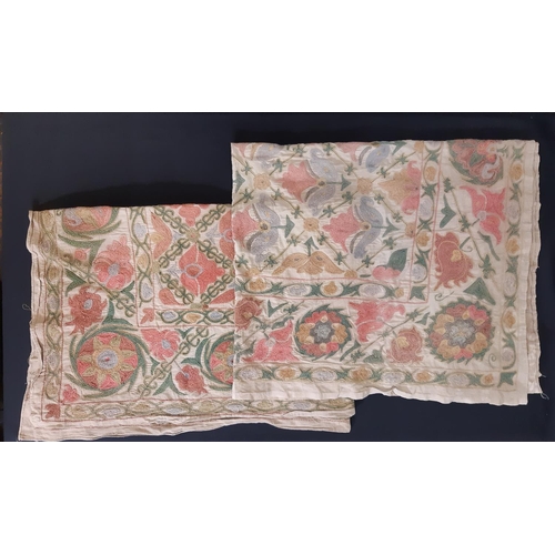 418 - 2 crewel work textile panels both with repeating floral motifs worked in chain stitch on cotton grou... 