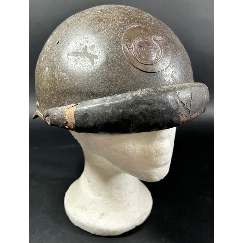 1769 - A French WWI period Trench Helmet, with applied ‘R F’ insignia.