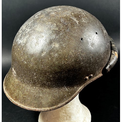 1769 - A French WWI period Trench Helmet, with applied ‘R F’ insignia.