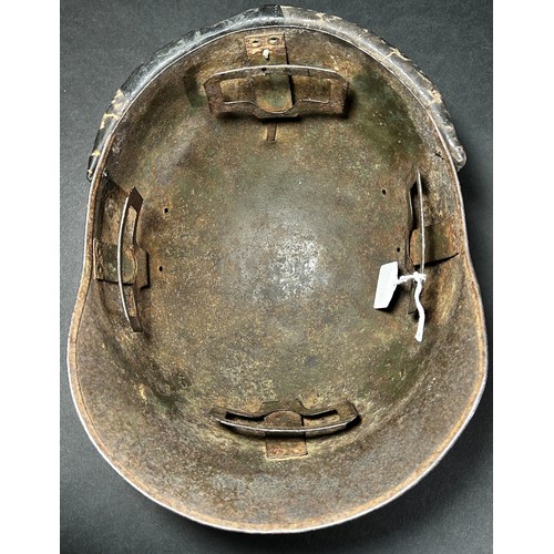 1769 - A French WWI period Trench Helmet, with applied ‘R F’ insignia.