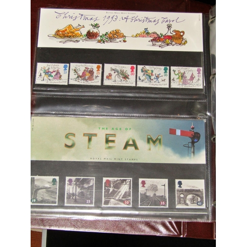 320 - Two Royal Mint presentation folios containing stamps from the early 1980s to c.2000, The Improved Po... 