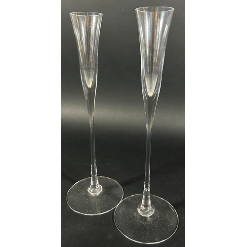 1126 - A pair of elegant long stemmed Limoncello glasses, 25.5cm tall, a pair of Stuart Champagne flutes, a... 