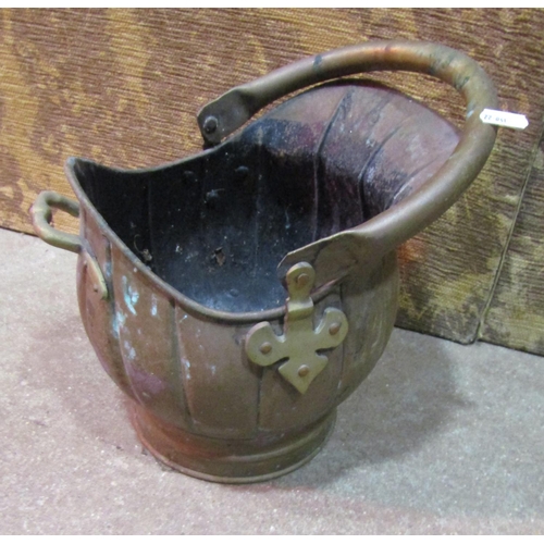 2137 - A copper helmet shaped coal bucket one other in brass, an unusual eastern copper and brass overlaid ... 