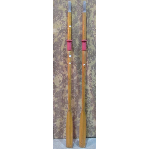 2143 - A pair of vintage rowing boat oars