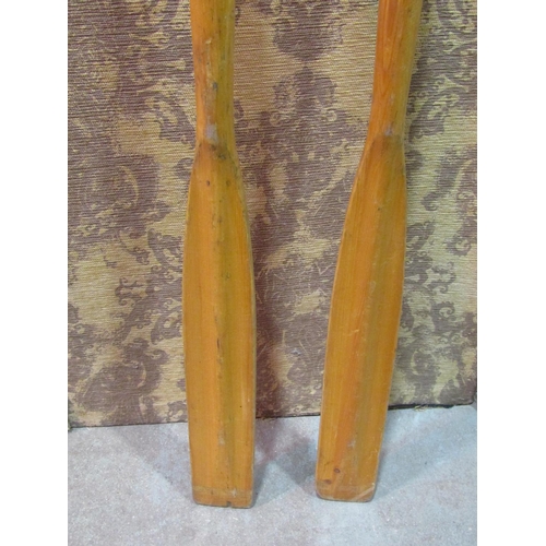 2143 - A pair of vintage rowing boat oars