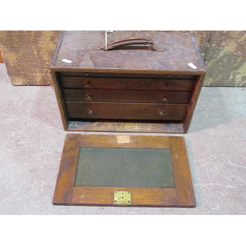 2151 - A small vintage portable oak engineers tool box with panelled removeable fall front, enclosing four ... 