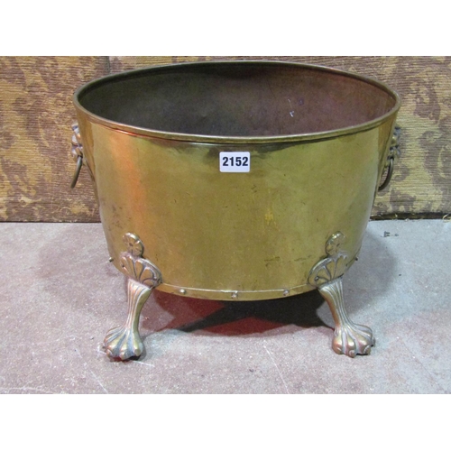 2152 - An oval brass coal bin with lions mask and ring handles and splayed paw feet, 42cm x 34cm x 30cm hig... 