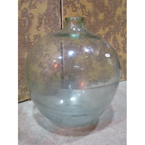 2162 - 2 similar vintage light green tinted glass carboys, 54cm high