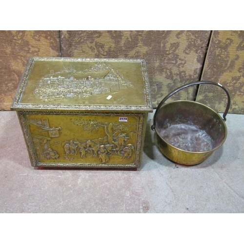 2174 - A large pressed brass coal bin with figural Tavern seen decoration together with a brass jam pan (2)