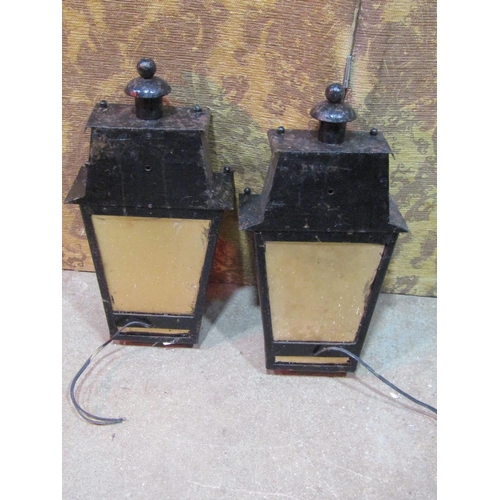 2178 - A pair of exterior wall mounted porch lanterns of tapered form with glazed panels (af)