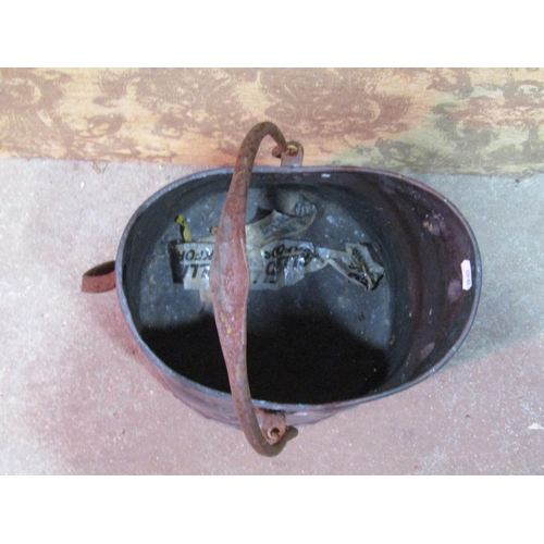 2185 - An arts and crafts copper coal helmet with loose steel loop handle (af) together with a good quality... 