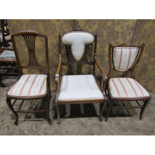 2192 - Three Edwardian lightweight chairs, two with inlaid detail, the other with open arms and swept sabre... 