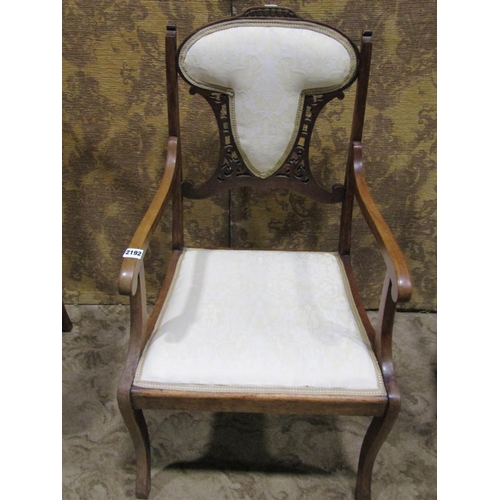 2192 - Three Edwardian lightweight chairs, two with inlaid detail, the other with open arms and swept sabre... 