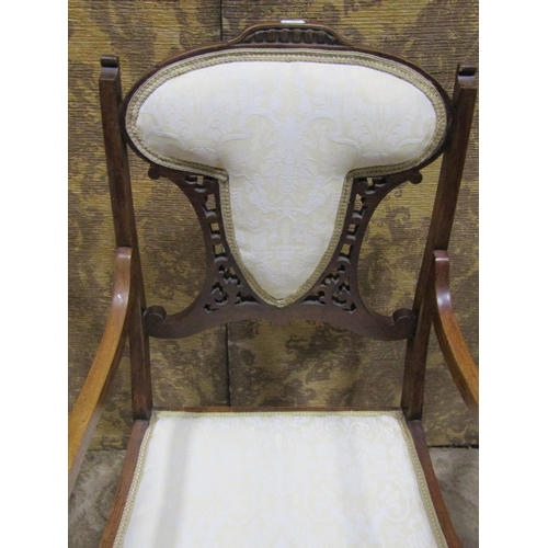 2192 - Three Edwardian lightweight chairs, two with inlaid detail, the other with open arms and swept sabre... 