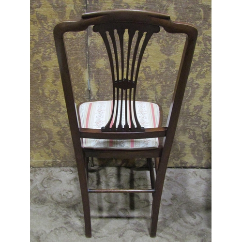 2192 - Three Edwardian lightweight chairs, two with inlaid detail, the other with open arms and swept sabre... 