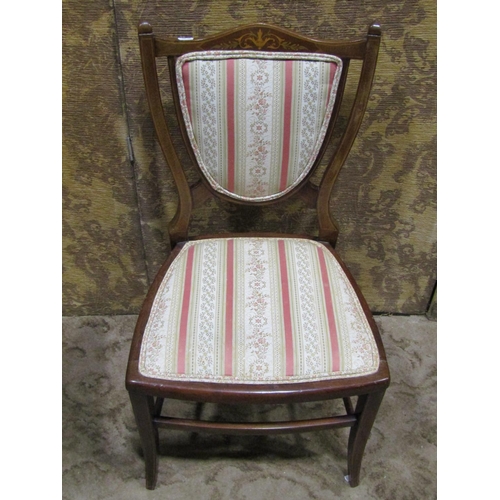 2192 - Three Edwardian lightweight chairs, two with inlaid detail, the other with open arms and swept sabre... 