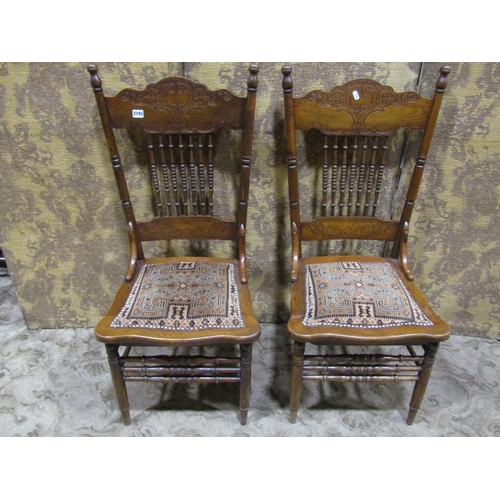 2193 - Pair of low dining/side chairs with turned bobbin spindle backs, carved detail and upholstered kelim... 