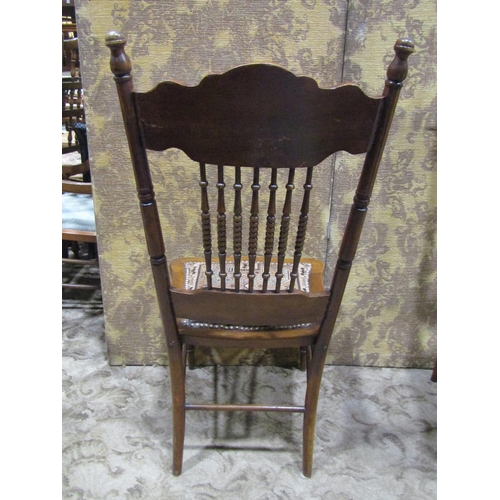 2193 - Pair of low dining/side chairs with turned bobbin spindle backs, carved detail and upholstered kelim... 