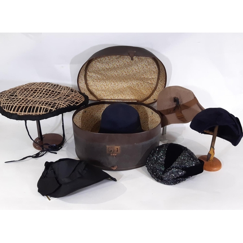 440 - A collection of vintage ladies clothing including  felt hats, a simple woven cane/ black silk sun ha... 