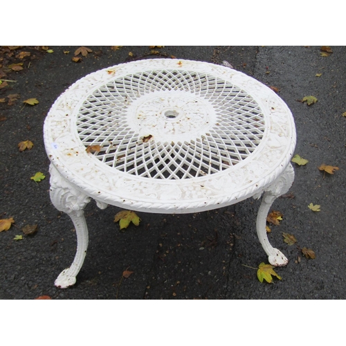2017 - A low painted cast iron circular garden table, the decorative pierced lattice top with repeating gra... 