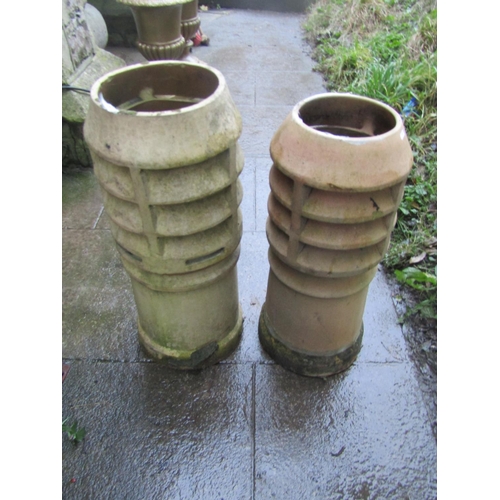 2019 - Two weathered buff coloured cylindrical vented chimney pots, slight variant in height and design, 78... 