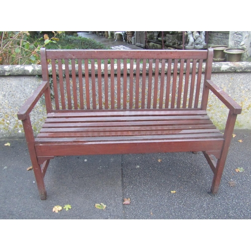 2022 - Contemporary stained hardwood two seat garden bench with slatted seat and back, 122cm wide