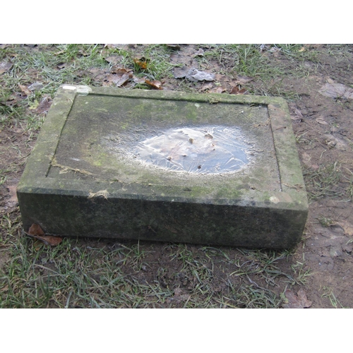 2085 - A weathered cut natural stone chopping block, 45cm x 33cm x 10cm thick