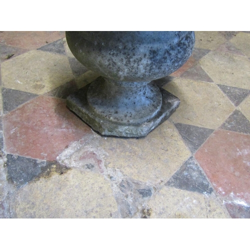 2093 - Small weathered marble urn with square cut base, 31cm high (af) together with two carved marble mort... 