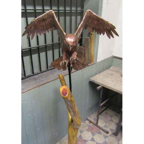 2096 - A life sized representation of a Peregrine Falcon in mahogany, overlaid with copper, the basic shape... 