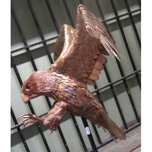 2096 - A life sized representation of a Peregrine Falcon in mahogany, overlaid with copper, the basic shape... 