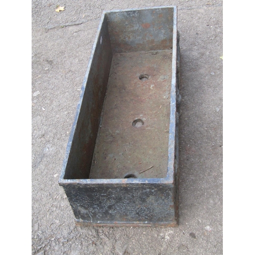 2098 - A vintage weathered rectangular cast iron planter with classical raised relief swag and urn detail, ... 