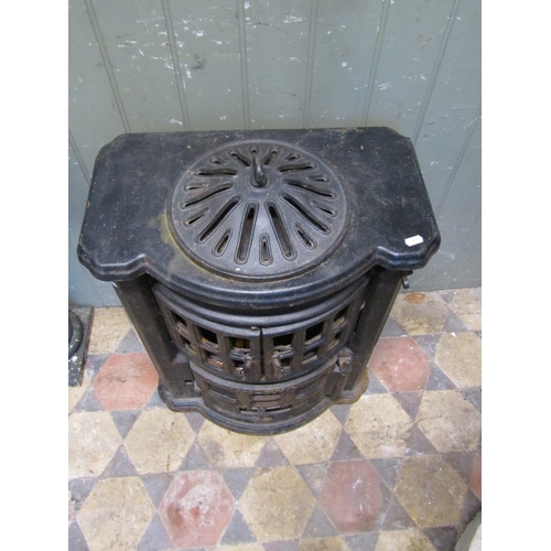 2100 - An Esse no2 cast iron bow fronted stove with pierced dome cap, (af for re-glazing) approx 50cm wide ... 