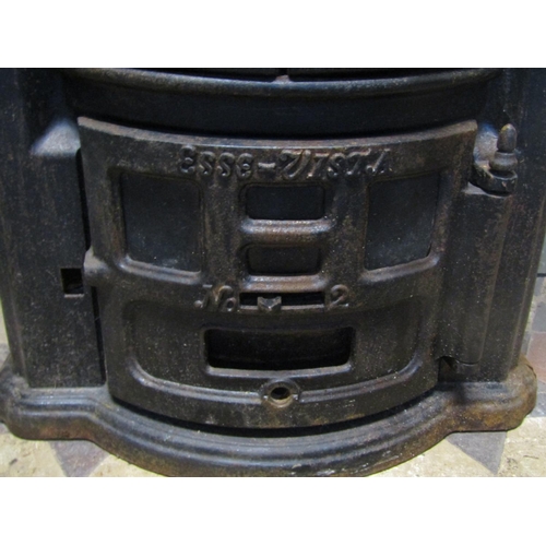 2100 - An Esse no2 cast iron bow fronted stove with pierced dome cap, (af for re-glazing) approx 50cm wide ... 