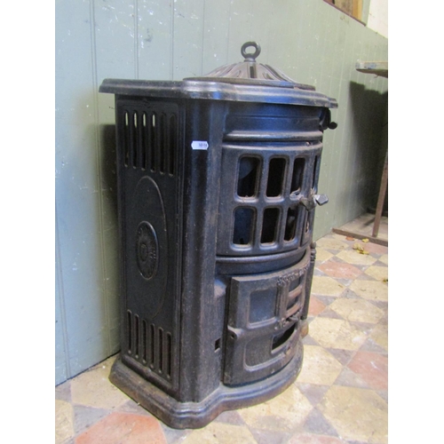 2100 - An Esse no2 cast iron bow fronted stove with pierced dome cap, (af for re-glazing) approx 50cm wide ... 