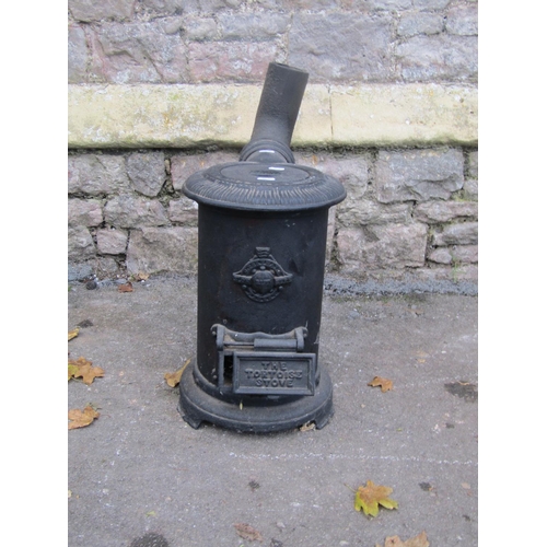 2101 - 'The Tortoise' cast iron stove, approx 40cm high x 26cm diameter