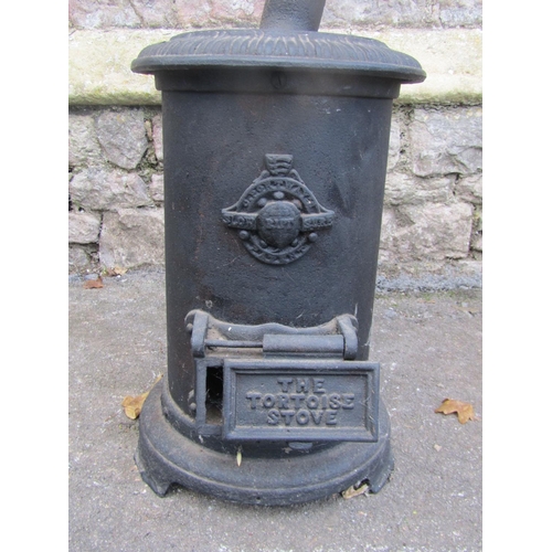 2101 - 'The Tortoise' cast iron stove, approx 40cm high x 26cm diameter