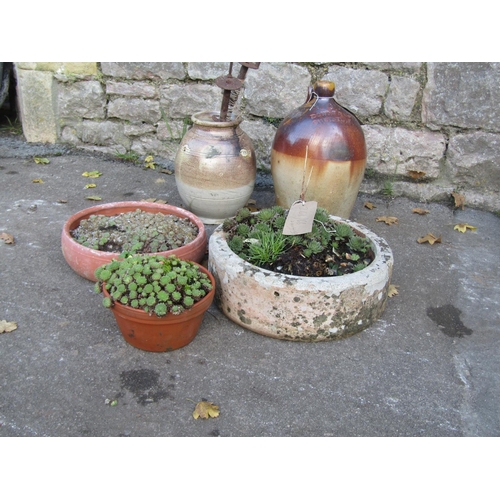 2119 - Salt glazed stoneware flagon stamped Dowle & co Chepstow (af) together with a weathered squat circul... 