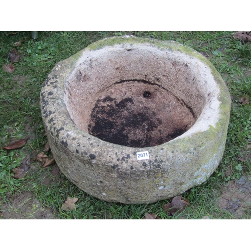 2071 - A good weathered imitation stone trough squat circular form 57cm diameter x 24cm high