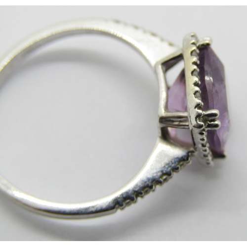 1357 - 18ct white gold square amethyst and diamond ring, size K, 2.4g